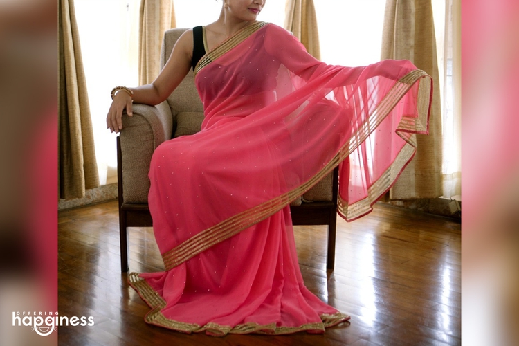 Pink Georgette Saree with gold studded border
