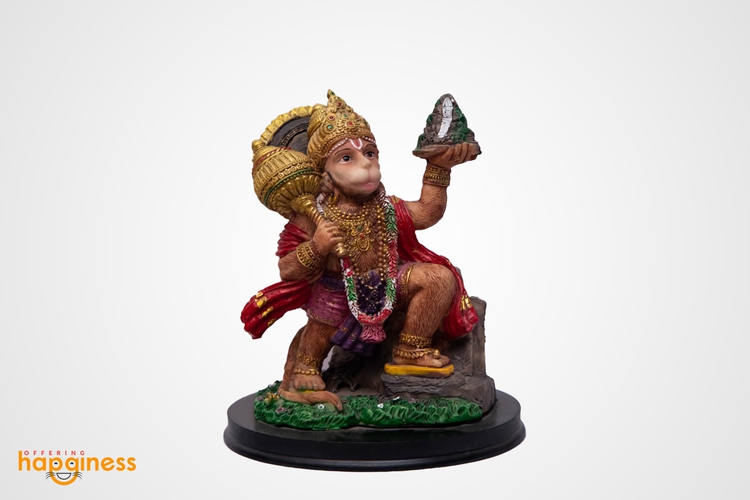 Carrying Hanuman Statue