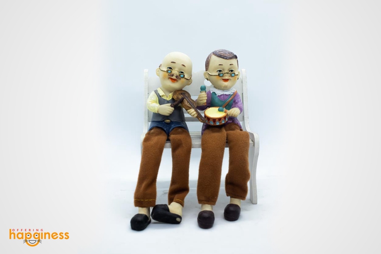 Couple in Bench Statue