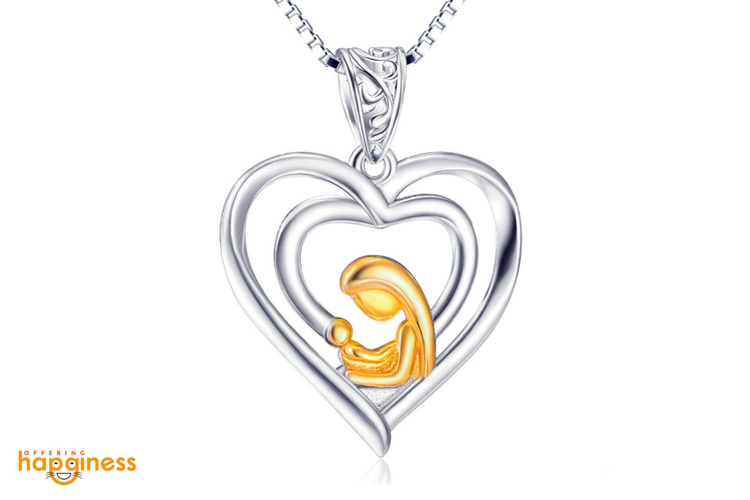 Mother holding baby pendant