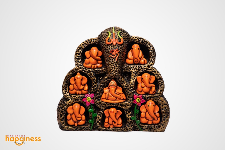 Eight Orange Ganesh Statue